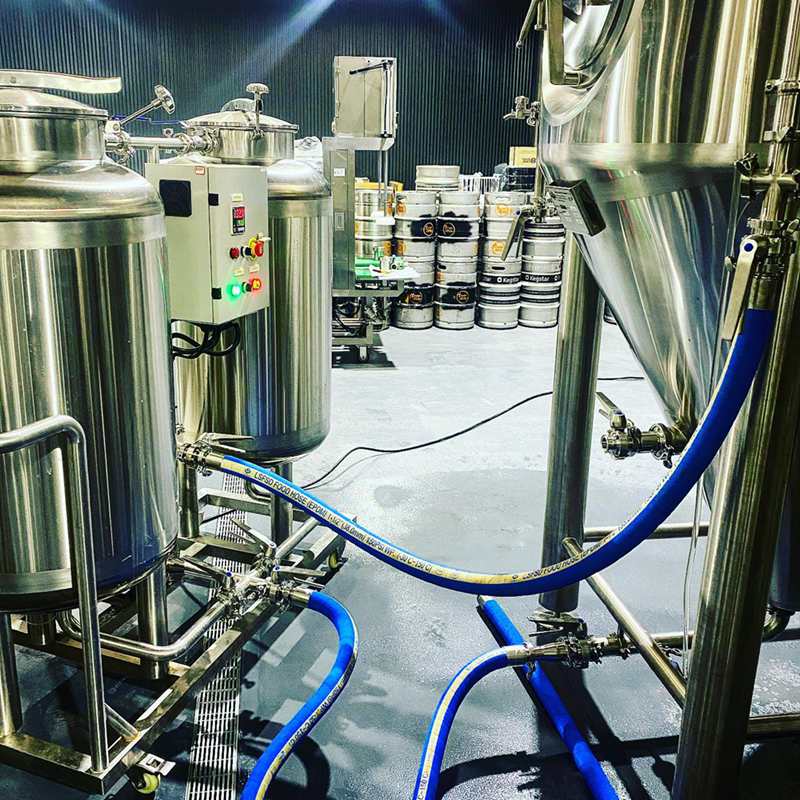 What temperature is caustic wash for beer fermenters?